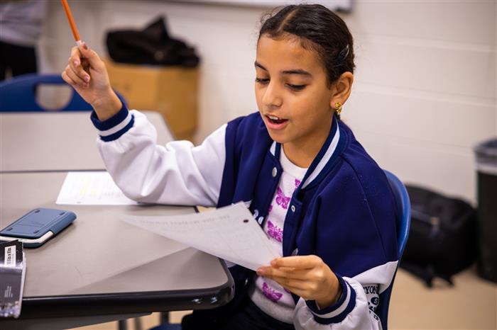 Student reading an assignment
